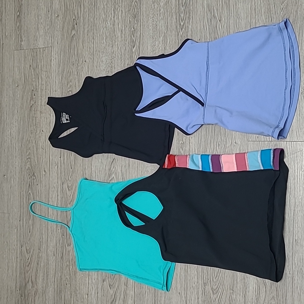 Bundle of 4 Older Lululemon Athletica Tanks; Size 4s